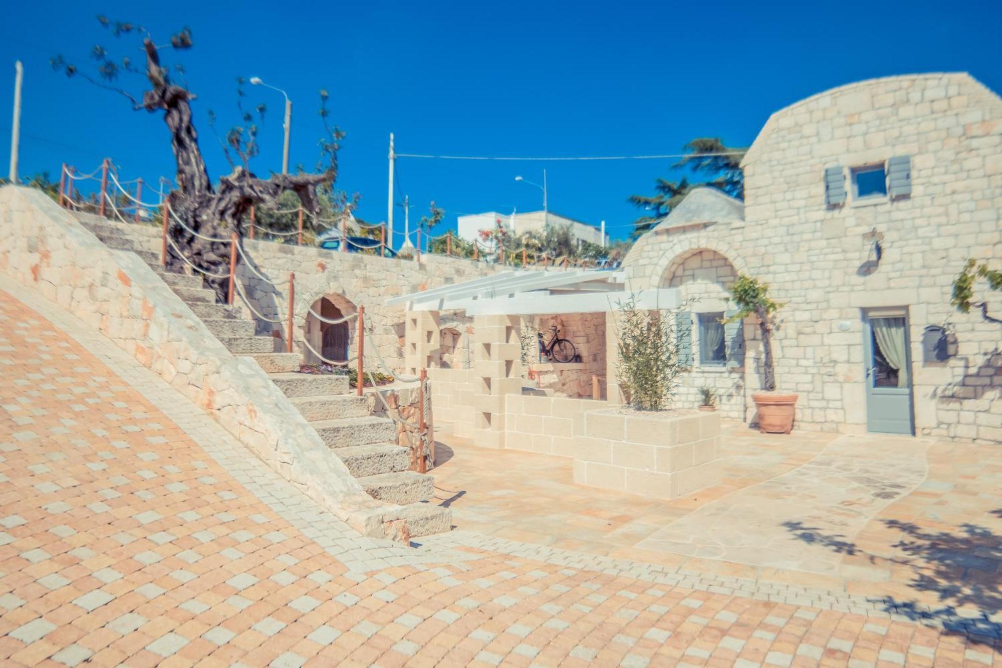 洛科罗通多Navolte Trulli E Quiete Con Piscina别墅 外观 照片